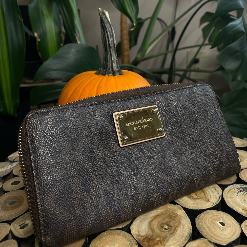 MK large monogram quarter zip jet set wallet